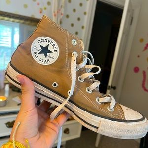 Brown Chuck Taylor Converse high tops